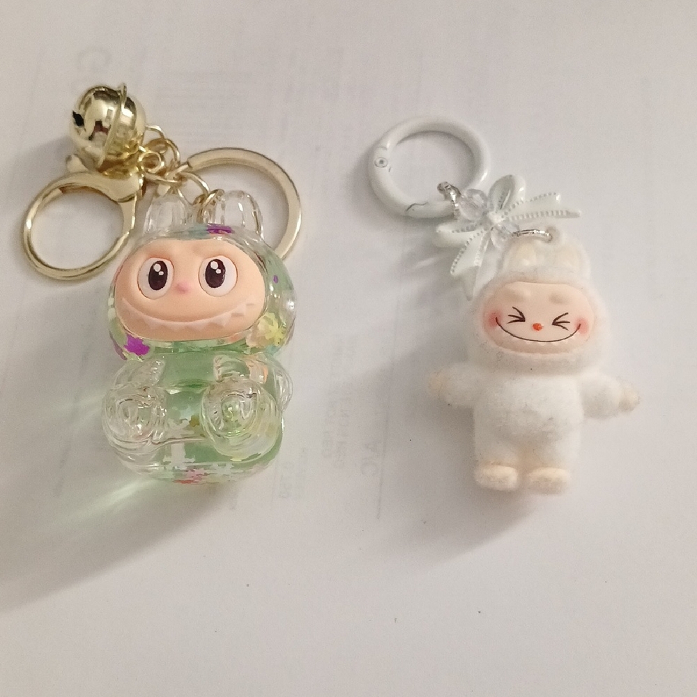 Charming Animal Keychain Duo - Clear and White